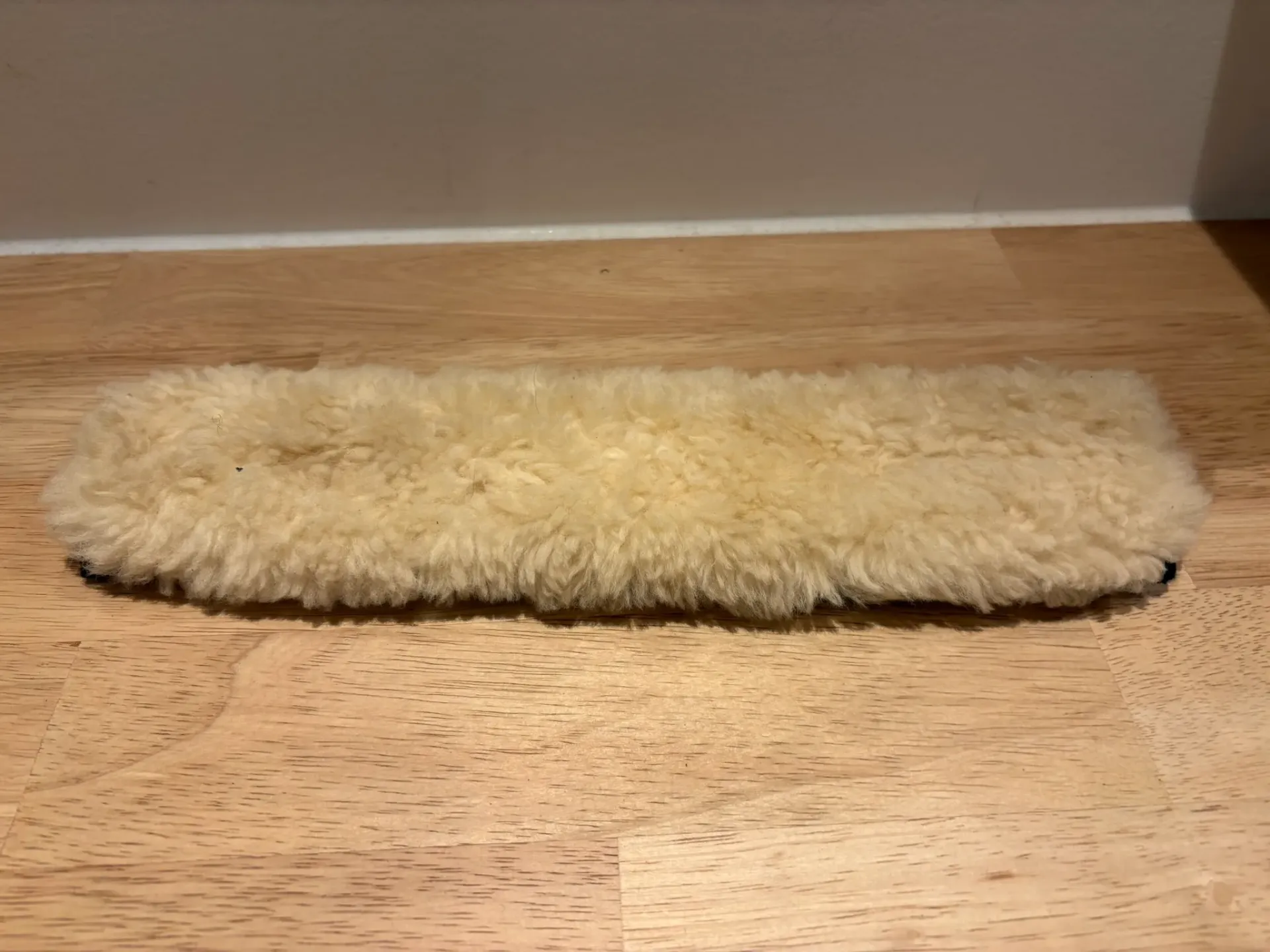 Beschermwol neusriem